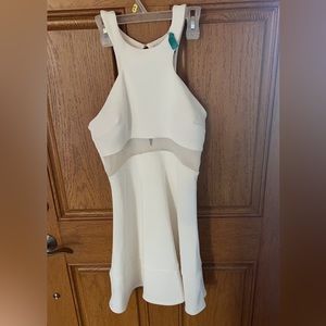 Solid white with mesh in the middle mini dress